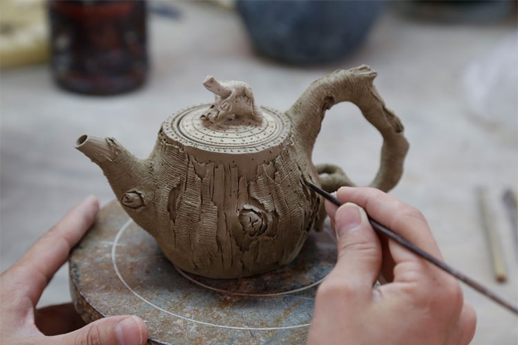 仿木外皮紫砂壺，創(chuàng